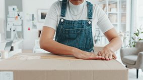 Woman packing box, package and cargo with tape for delivery, sale and shipping in workshop, startup store and creative studio. Female small business owner prepare product, order and service logistics - Powered by Shutterstock - Get 15% off with code: PIKWIZARD15