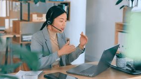 Asian woman, video call and laptop with headset for communication, webinar and crm. Entrepreneur person talking with hands for online meeting, customer support or consultation service and advice