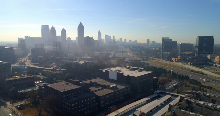 Aerial Shot Of Financial District With 191 Peachtree Tower, Drone Flying Backward Over City On Sunny Day - Atlanta, Georgia