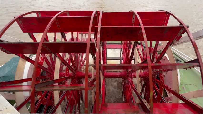 Riverboat paddlewheel in motion on the Mississippi River 4k