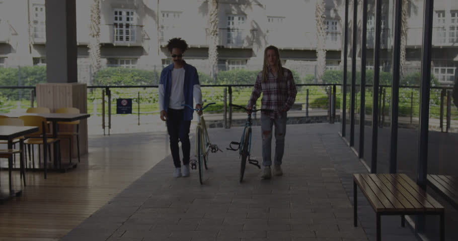 Animation of data processing over biracial male friends with bicycles. global business and digital interface concept digitally generated video.