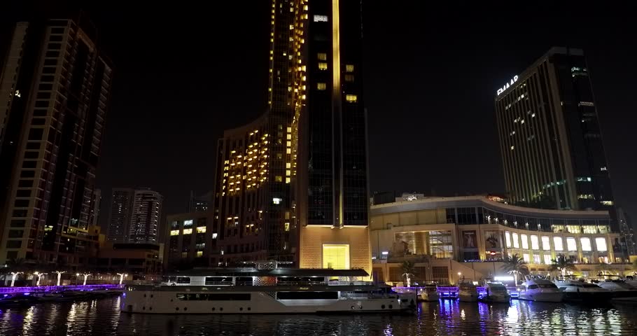 Dubai, United Arab Emirates. Night trip of Dubai Marina is a district in Dubai, United Arab Emirates.
