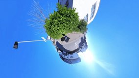 Little Tiny Planet 360 Small World View Of A Man Walking On Street Near Signs in 4K