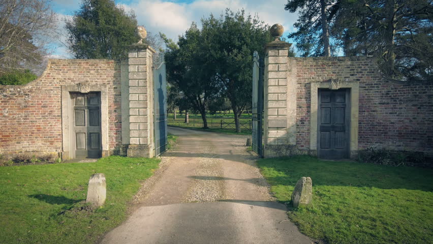 Entering Through Gates Of Mansion
