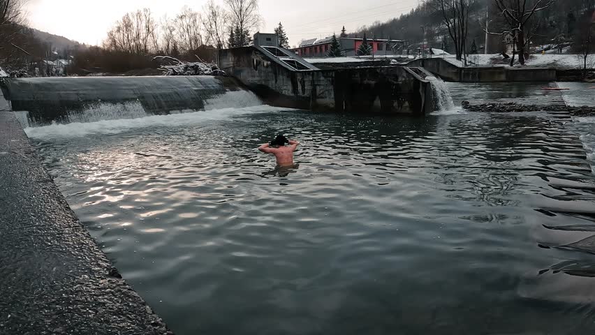 Cold Water Bathing in the River during Winter Season. Royalty-Free Stock Footage #1101009535