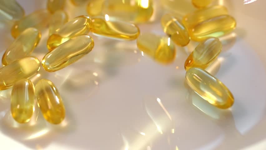 Pills Vitamins Omega 3 or fish oil. Bagamo pills close-up. To be healthy and take care of your health. Pharmaceutical industry. Business of biological supplements and vitamin. Royalty-Free Stock Footage #1101010835