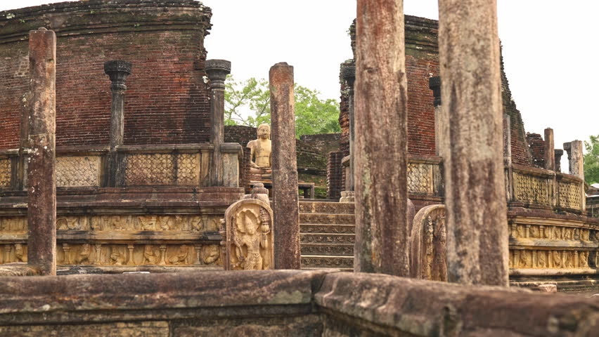 Ancient ruins of Vatadage stupa with a Buddha statue in the center, Pollonnaruwa, Sri Lanka