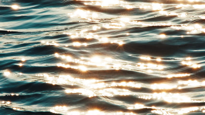 Water surface with flares at sunset Royalty-Free Stock Footage #1101015801