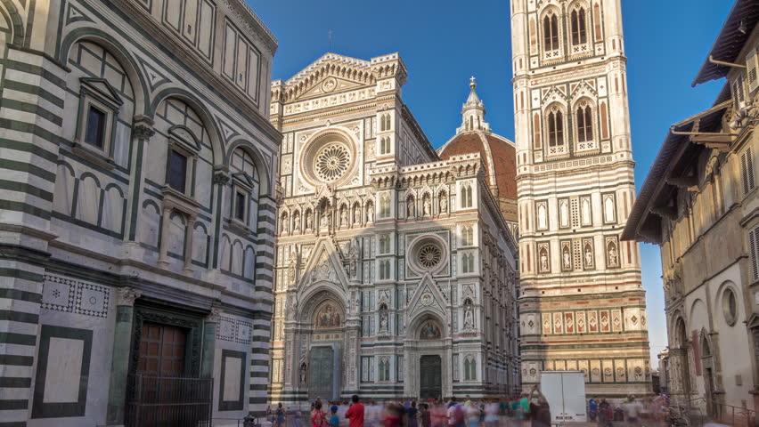 Facade of The Basilica di Santa Maria del Fiore timelapse hyperlapse which is the cathedral church (Duomo) of Florence in Italy. Shadows moves on facade during sunset Royalty-Free Stock Footage #1101016845