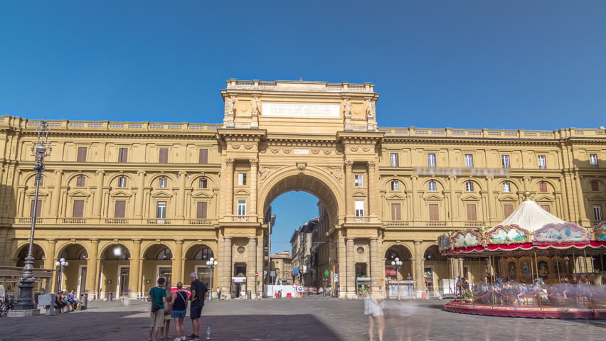 Republic Square timelapse hyperlapse with Colonna dell Abbondanza and the arch in honor of the first king of united Italy, Victor Emmanuel II. Blue sky at summer day. Florence, Italy