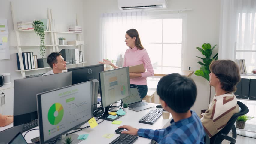 Group of young businessman and businesswoman people working in office. Attractive employee brainstorm and meeting as team, plan and discuss project in workplace. Corporate of modern colleagues concept | Shutterstock HD Video #1101023985
