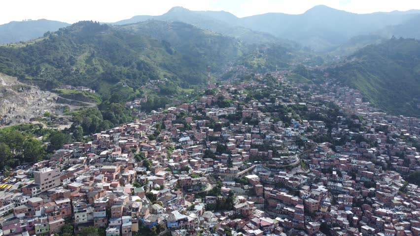 Aerial video over the community of Comuna 13 in Medellin, Colombia.