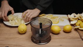 I throw a Lemon into a black blender and grind it for homemade Lemonade. Slow motion