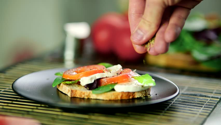 Antipasti Toast On Breakfast With Mozzarella. Italian Fine Dinning. Homemade Cooking Antipasti Toast. Mediterranean Food In Restaurant. Platter Food Cuisine. Delicious Dinner Toast With Tomato Cheese | Shutterstock HD Video #1101029651