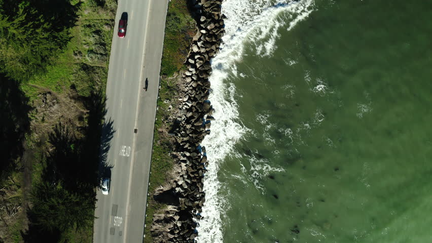 Drone view of waves crashing in Santa Cruz, California Royalty-Free Stock Footage #1101032661