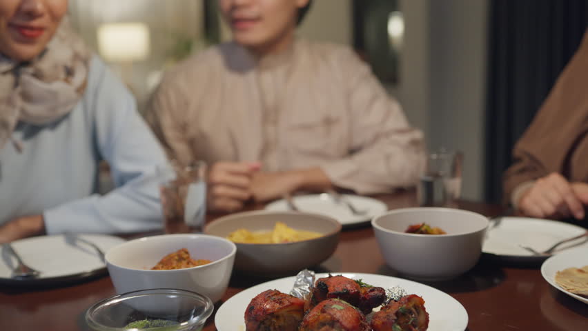 Close-up dates fruit dish Eid Mubarak Muslim Asia family have Iftar dinner to break feast. Traditional food during Ramadan fasting month at home, The Islamic Halal Eating and Drinking at modern Islam. Royalty-Free Stock Footage #1101033729