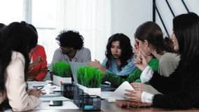 Young business financial team work together in project brainstorm meeting. Cooperate teamwork, strategy planning, small business startup company, or office coworker collaborate concept. Student group  - Powered by Shutterstock - Get 15% off with code: PIKWIZARD15