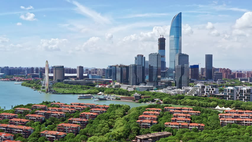 Aerial footage of city skyline and modern buildings scenery in Suzhou, China.
