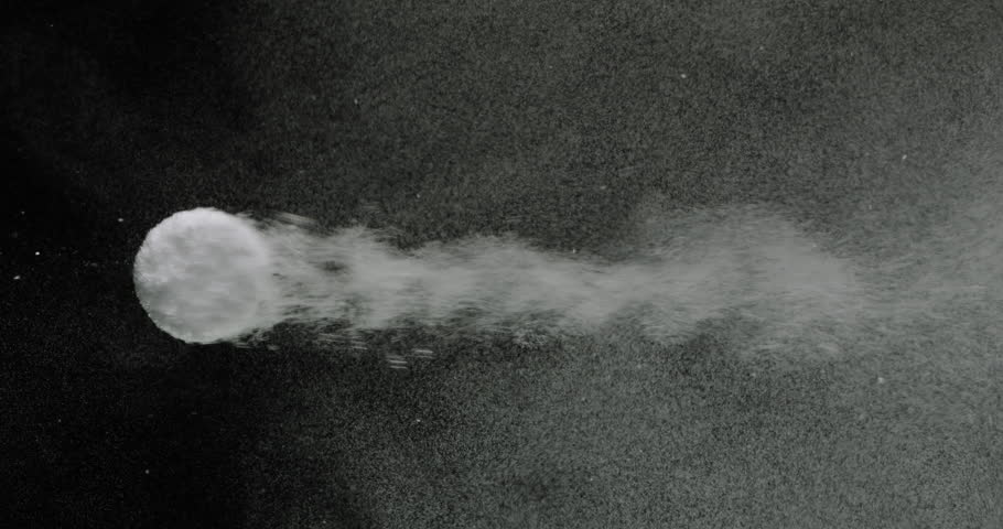 Effervescent antacid tablet in glass of water on black background
