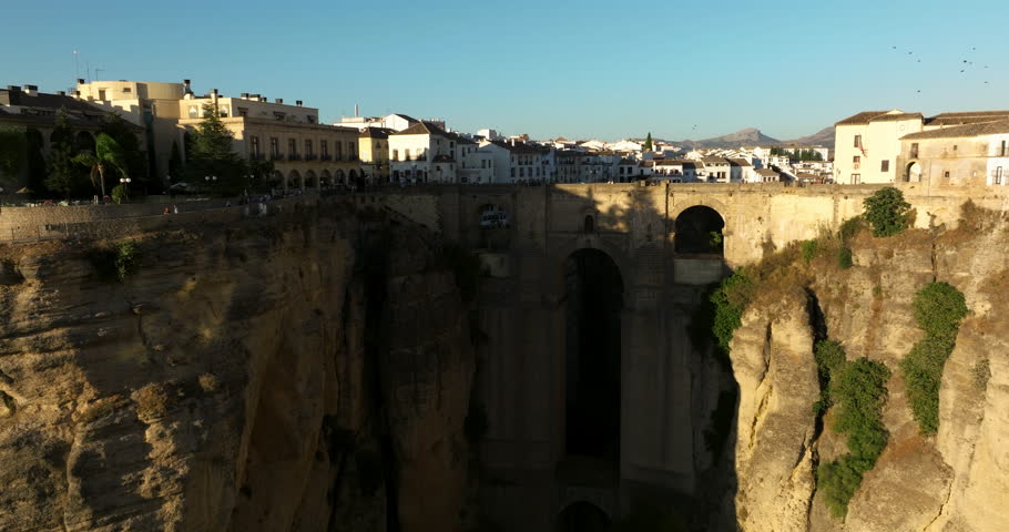 Puente Nuevo (New Bridge) In Ronda, Andalusia, Spain At Sunset - aerial drone shot