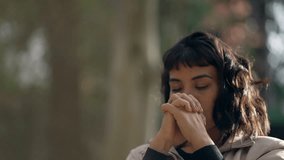 Spiritual woman praying to GOD feeling FREEDOM. Person looking at sky with HOPE and FAITH standing outdoors in nature - Powered by Shutterstock - Get 15% off with code: PIKWIZARD15