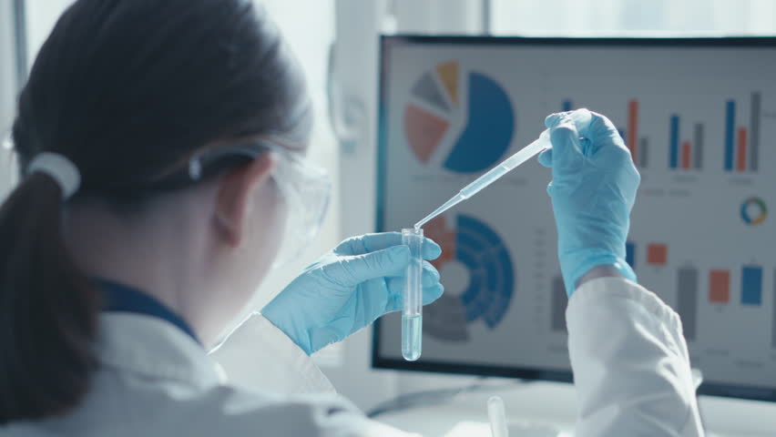 Medical research laboratory. A scientist works with a pipette and a test tube. Scientific laboratory of biotechnology, development of medicine and research in chemistry, biochemistry and experiments. Royalty-Free Stock Footage #1101056697