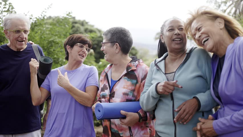 Happy sport group of senior people having fun exercising outdoors at park city - Multiracial elderly community concept Royalty-Free Stock Footage #1101056729