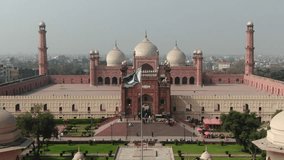 Drone footage of the Badshahi Mosque in Lahore, Pakistan Flag, 4K