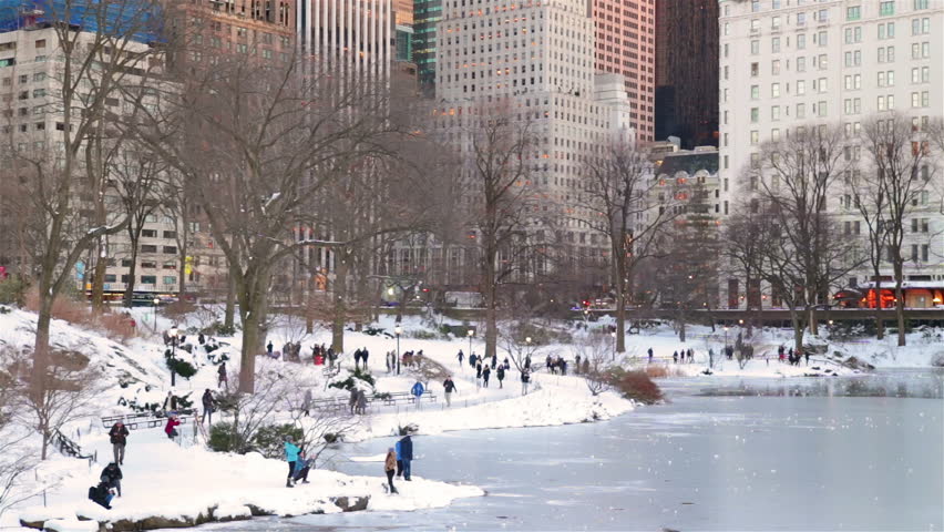 People walking on snow in Central Park New York City Winter Royalty-Free Stock Footage #1101065939