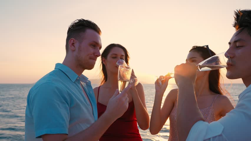 Group of business friends together celebrating and enjoying party with drinking champagne on sail yacht, Outdoor lifestyle of the sea  and travel vacation concept | Shutterstock HD Video #1101068301