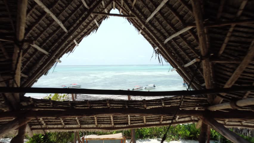 Beautiful Sea landscape on Sunny Day Indian Ocean Zanzibar Island Blue Water Boats Royalty-Free Stock Footage #1101071535