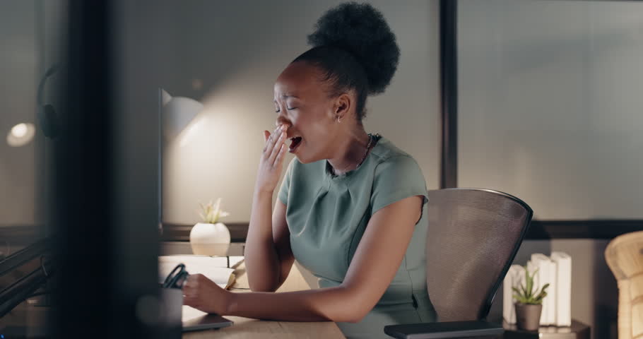 Stress, headache and black woman with headphones in office listening to music to relax in workplace. Burnout, deadline and female employee with earphones for radio, audio and song working at night | Shutterstock HD Video #1101072605