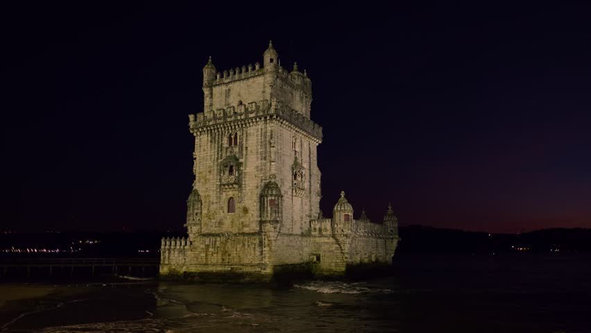 Belem Tower or Tower of St Vincent - famous tourist landmark of Lisboa and tourism attraction - on the bank of the Tagus River (Tejo) in the night. Lisbon, Portugal