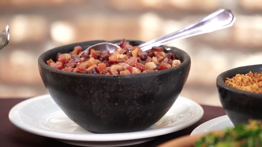 Crackling and Cheiro verde in clay bowl