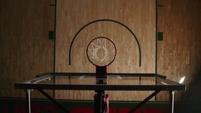 Male Athlete Sinking Hoops and Executing a Slam Dunk Indoors, Top Down - Powered by Shutterstock - Get 15% off with code: PIKWIZARD15