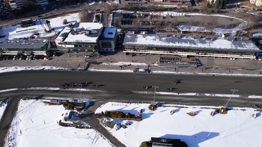 Horse chariots in a competition.