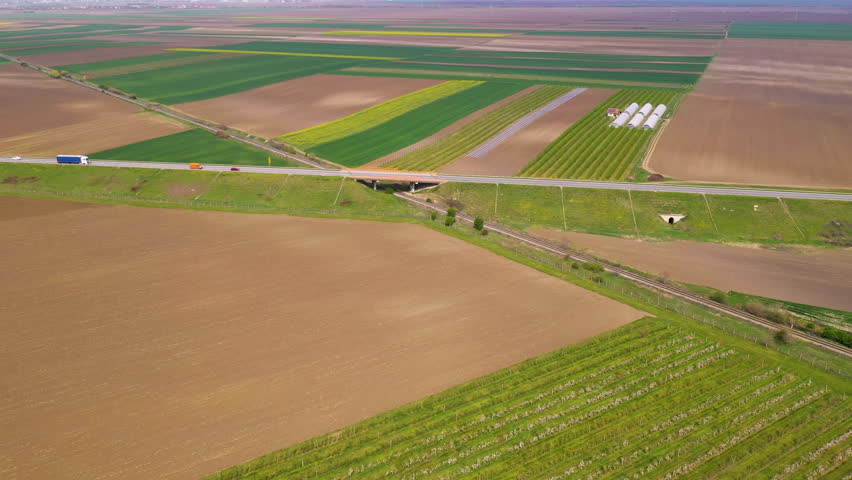 Aerial shot of traffic on the road overpass, drone pov high angle view