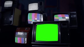 Old TV Green Screen and Many Televisions with Test Card Pattern and Static Noise. Dark Tone. Zoom In. You can replace green screen with the footage or picture you want with “Keying” effect.