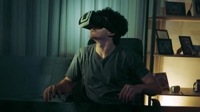 Video gamer player with immersion glasses for virtual reality.