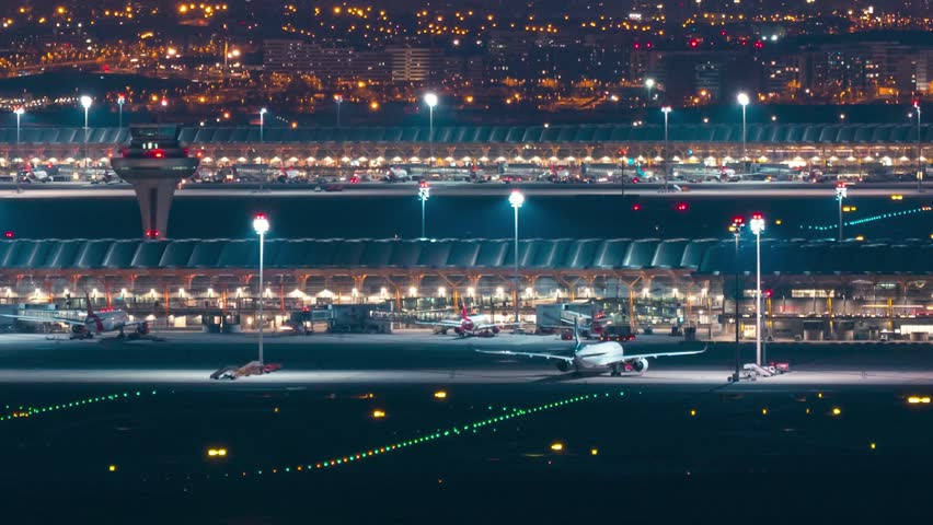 Timelapse blue hour and night time Barajas airport planes | Shutterstock HD Video #1101088597