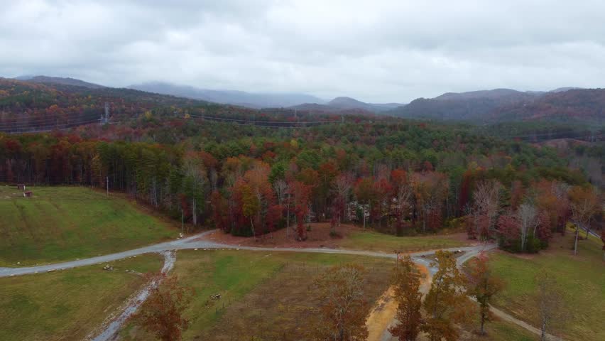 An elevator drone shot of the fall mountains in Sunset, South Carolina.