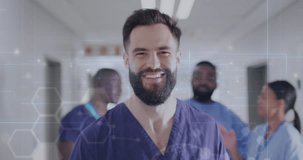 Animation of medical data over portrait of smiling bearded male doctor in hospital corridor. Medical and healthcare services concept digitally generated video.