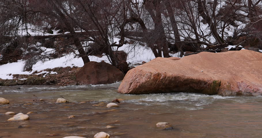 Zion National Park Utah Virgin River water winter. Southwestern desert Utah near St George. Red stone mountains. Geological landscape wind, weather and water carved spectacular beautiful mountain.
