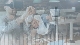 Animation of statistical data processing against caucasian man wearing vr headset at office. Business data and futuristic technology concept - Powered by Shutterstock - Get 15% off with code: PIKWIZARD15