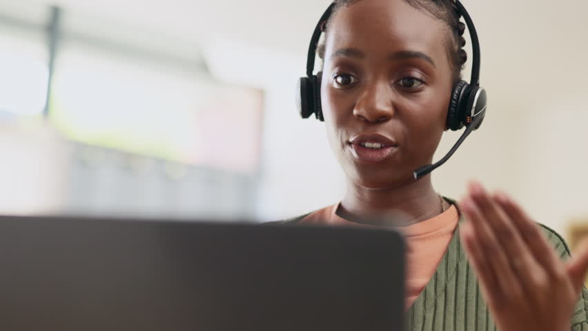 Black woman, face and call center, contact us and talk with client, help and advice, CRM and laptop. Headset with mic, communication and customer service with telemarketing, conversation and female Royalty-Free Stock Footage #1101116641