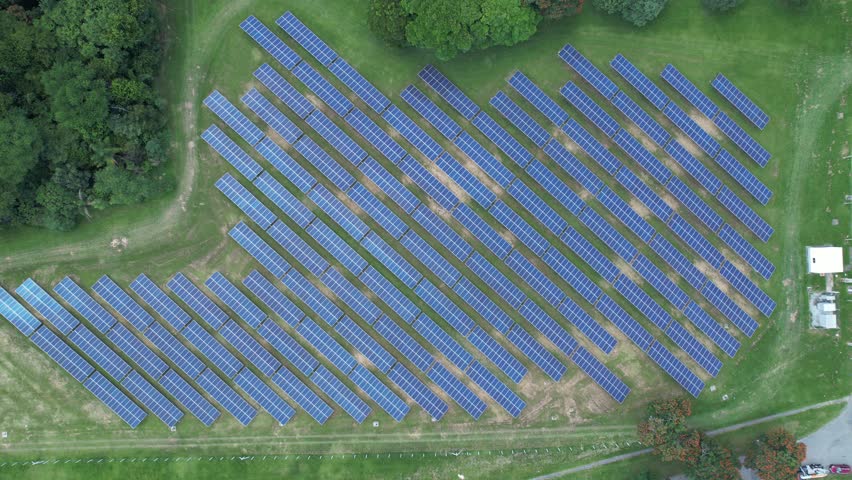Aerial view of solar panels in Sao Jose dos Campos, Brazil. Many renewable energy panels. Royalty-Free Stock Footage #1101126637