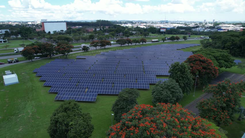 Aerial view of solar panels in Sao Jose dos Campos, Brazil. Many renewable energy panels. Royalty-Free Stock Footage #1101126639