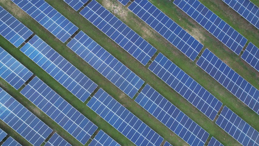 Aerial view of solar panels in Sao Jose dos Campos, Brazil. Many renewable energy panels. Royalty-Free Stock Footage #1101126641