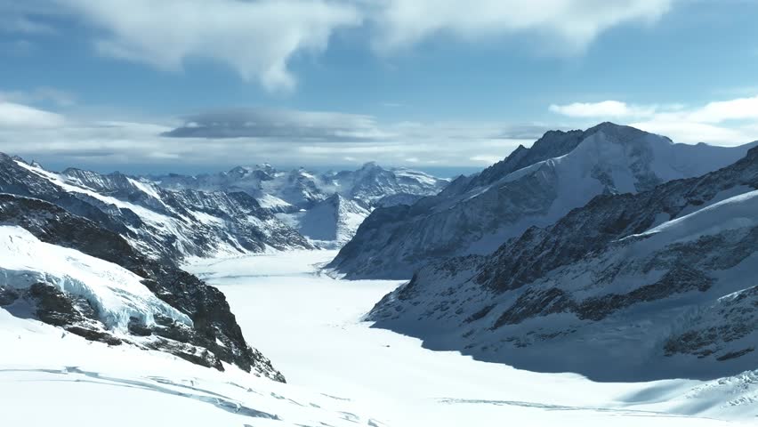 Aerial view of Great Aletsch Glacier, the largest glacier in the Alps and UNESCO heritage, in Canton of Valais, Switzerland. Aletsch glacier - ice panorama landscape in Alps of Switzerland, Europe