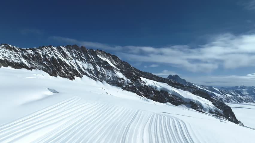 Aerial view of Great Aletsch Glacier, the largest glacier in the Alps and UNESCO heritage, in Canton of Valais, Switzerland. Aletsch glacier - ice panorama landscape in Alps of Switzerland, Europe